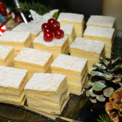 Various desserts in candy bar food buffet during hotel brunch, catering, cake pops, mousse, tarts