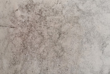 Texture of old gray concrete wall in scuffs for background.