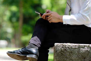 businessman using smartphone outdoor