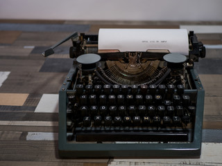 Fototapeta na wymiar close-up text COVID 2019 NO PANIC. old vintage typewriter with a sheet of white paper