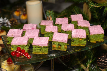 Various desserts in candy bar food buffet during hotel brunch, catering, cake pops, mousse, tarts