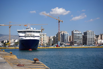 Photo of anchored passenger ferries in busy port of Piraeus on a spring morning, Attica, Greece
