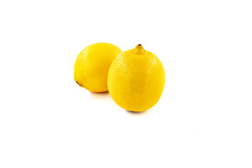 Two lemons isolated on white background. Creative healthy food concept. Flat lay.