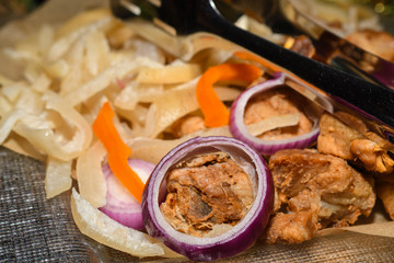Romanian traditional Christmas food buffet with sorici, caltabos, toba and pork meat cuts, ham