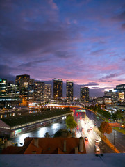 Sunset over city lights melbourne