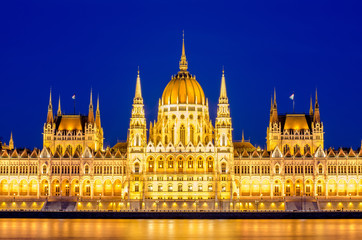 Fototapeta na wymiar Night view of the illuminated building of the hungarian parliament in Budapest