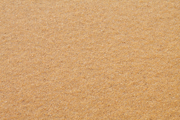 Textured wet sand beach background