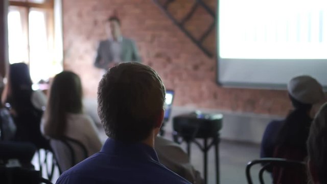 businessman team presenter presenting business Spbd training showing ideas on whiteboard projector in modern office presentation. colleagues in the audience enjoying training seminar. concept lecture