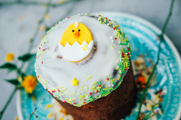 Traditional spring holidays concept. Easter cake decorated with glazing.