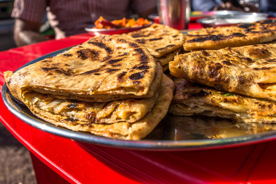 Tasty potato Parathas with curd and tea, Indian Breakfast
