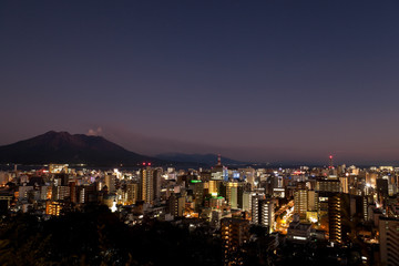 Fototapeta na wymiar 城山より見る鹿児島市街地の夜景と桜島 