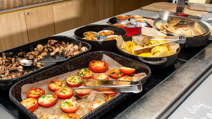 Selection of self service english continental breakfast buffet display, catering or brunch