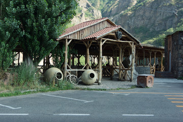 wooden porch on the side of the road in the Caucasus mountains