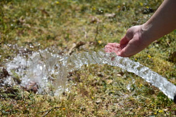 water flowing into a glass