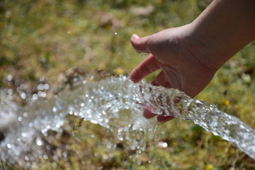 water pouring into a glass