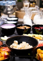Selection of self service catering continental breakfast buffet display, catering or brunch table