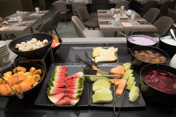 Selection of self service catering continental breakfast buffet display, catering or brunch table