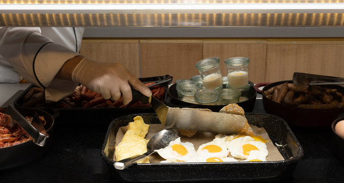 Fried And Scrambled Eggs And Omelette Station In A Hotel Or Restaurant Setting, Catering Breakfast