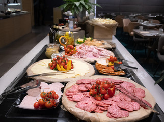 Selection of self service catering continental breakfast buffet display, catering or brunch table