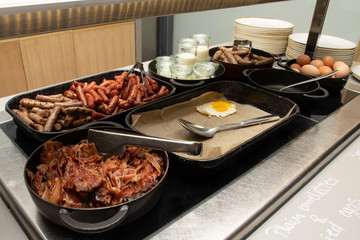 Selection of self service catering continental breakfast buffet display, catering or brunch table