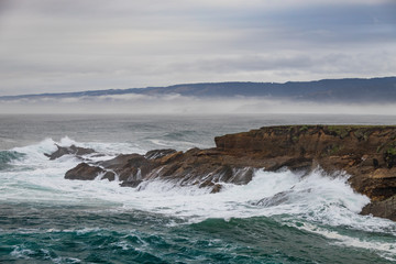 Waves breaking on the California coastline
