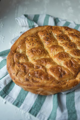 the type of bread used by the Muslim communities in fasting in Ramadan. ramadan pide on white background