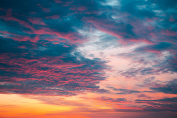 Orange sunset with blue and purple clouds