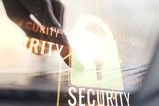 Creative lock sketch with chip hologram and hands typing on computer keyboard on background, protection of personal data concept. Multiexposure