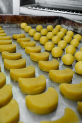 process making some of eid cookies, placed on aluminum tray
