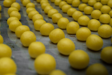 process making some of eid cookies, placed on aluminum tray