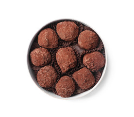 Box with tasty chocolate truffle candies isolated on white, top view