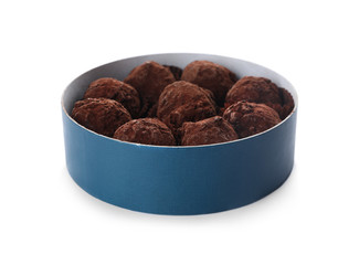 Box with tasty chocolate truffle candies isolated on white