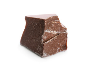 Piece of milk chocolate isolated on white