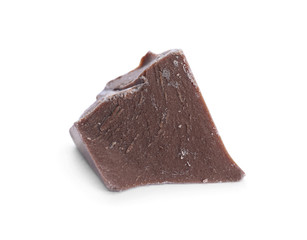 Piece of milk chocolate isolated on white