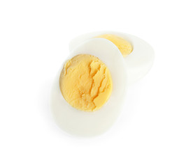 Halves of fresh hard boiled chicken egg isolated on white