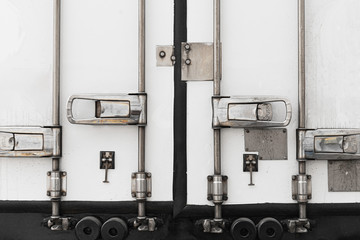 steel door security lock of a truck container, road freight transport, logistics.