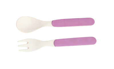 Small fork and spoon isolated on white, top view. Serving baby food