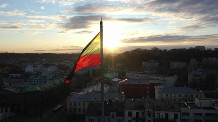 Lithuanian flag in the wind. Drone aerial view.