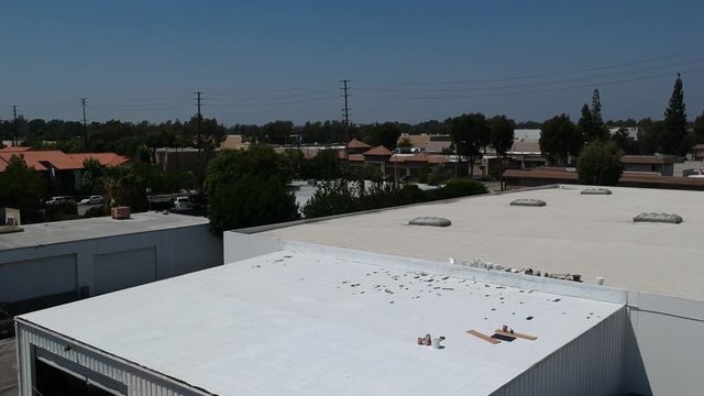 Aerial of a Industrial Business Factory Warehouse in Los Angeles on a Sunny Day