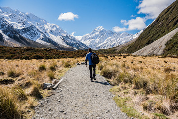 Fototapeta na wymiar Hiking the Hooker Valley track with snow covered mountain view, Mount Cook National Park NZ