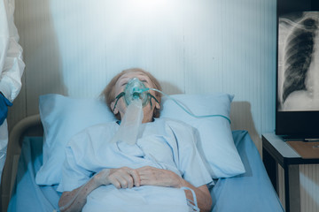 Medical team try to encourage and treat symptoms better to old woman patients from coronavirus...