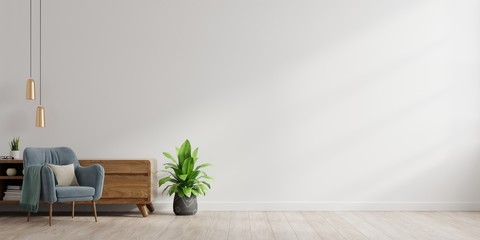 Interior of a bright living room with armchair on empty white wall background. © Vanitjan