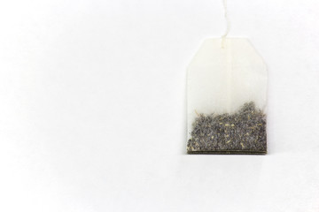 Tea bag on white background copy space