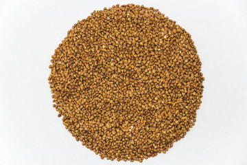 Buckwheat seeds closeup isolated on white background copy space