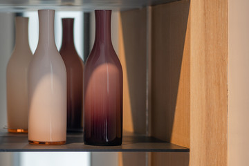 Beautiful glass vases interior display on glass shelf for office or home and living decoration in modern building