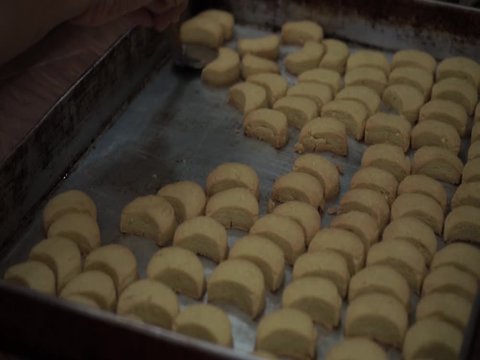 process of making putri salju, an indonesian typical eid cookies
