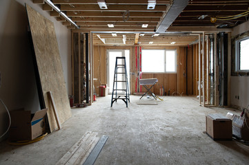Renovation at residential house in Toronto, Ontario. Tools and wood supply are present on the...