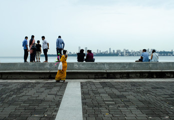 Bombay skyline with people in the foreground