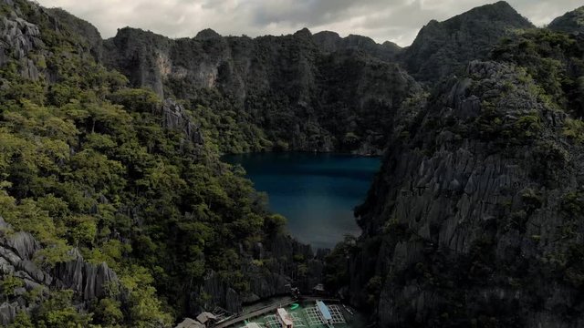 Aerial view of turquoise tropical lagoon with Karst limestone cliffs in Coron Island, Palawan, Philippines. UNESCO World Heritage Tentative List, Baracuda Lake