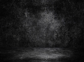Empty space of Studio dark room black concrete grunge wall with concrete floor.